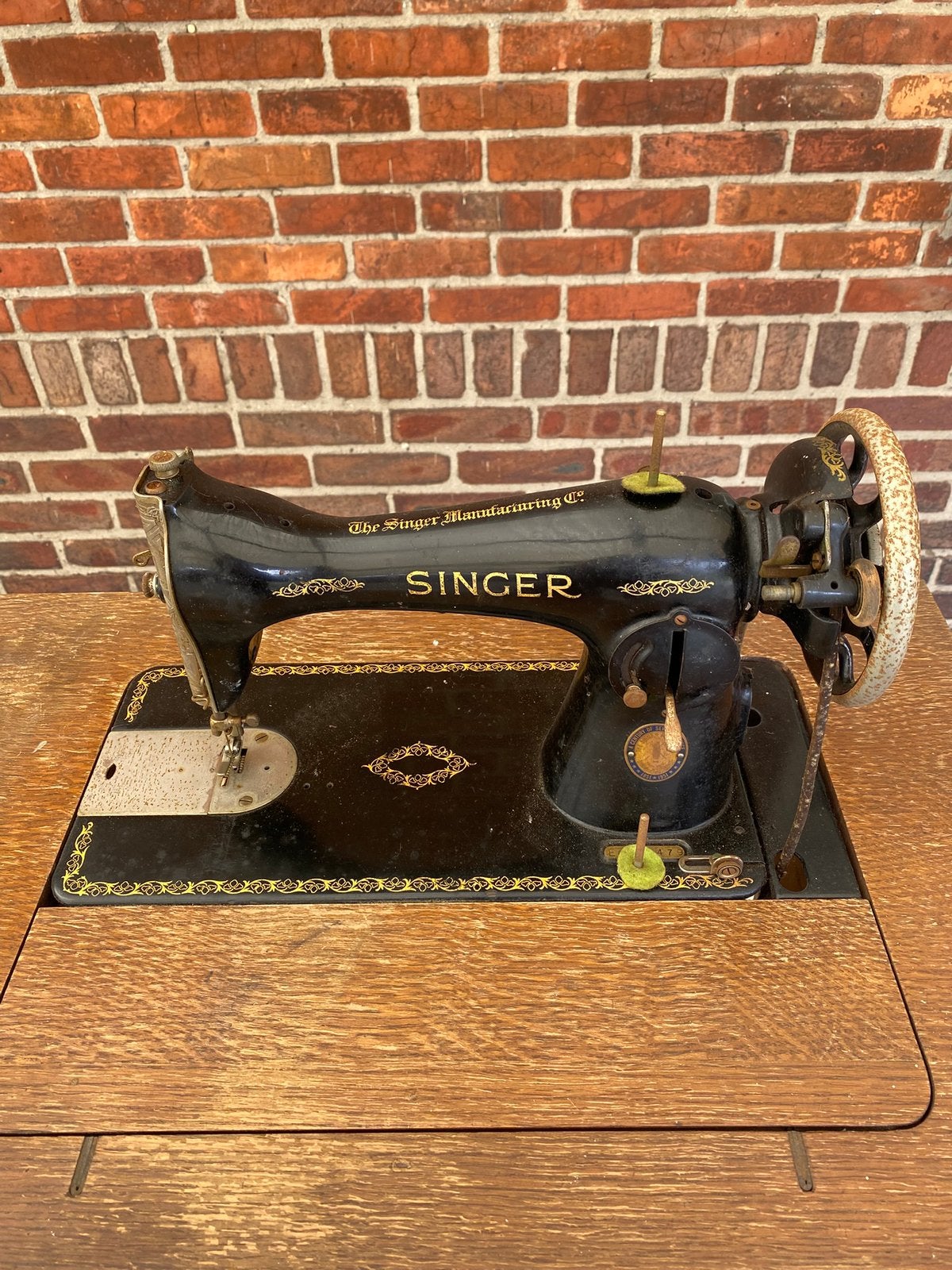 Antiek Singer Naaimachine, Enlèvement