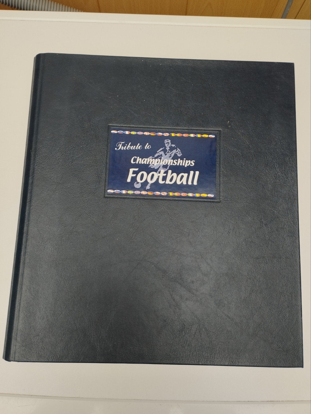 Een album denk over het WK voetbal met fdc en vellen, Ophalen