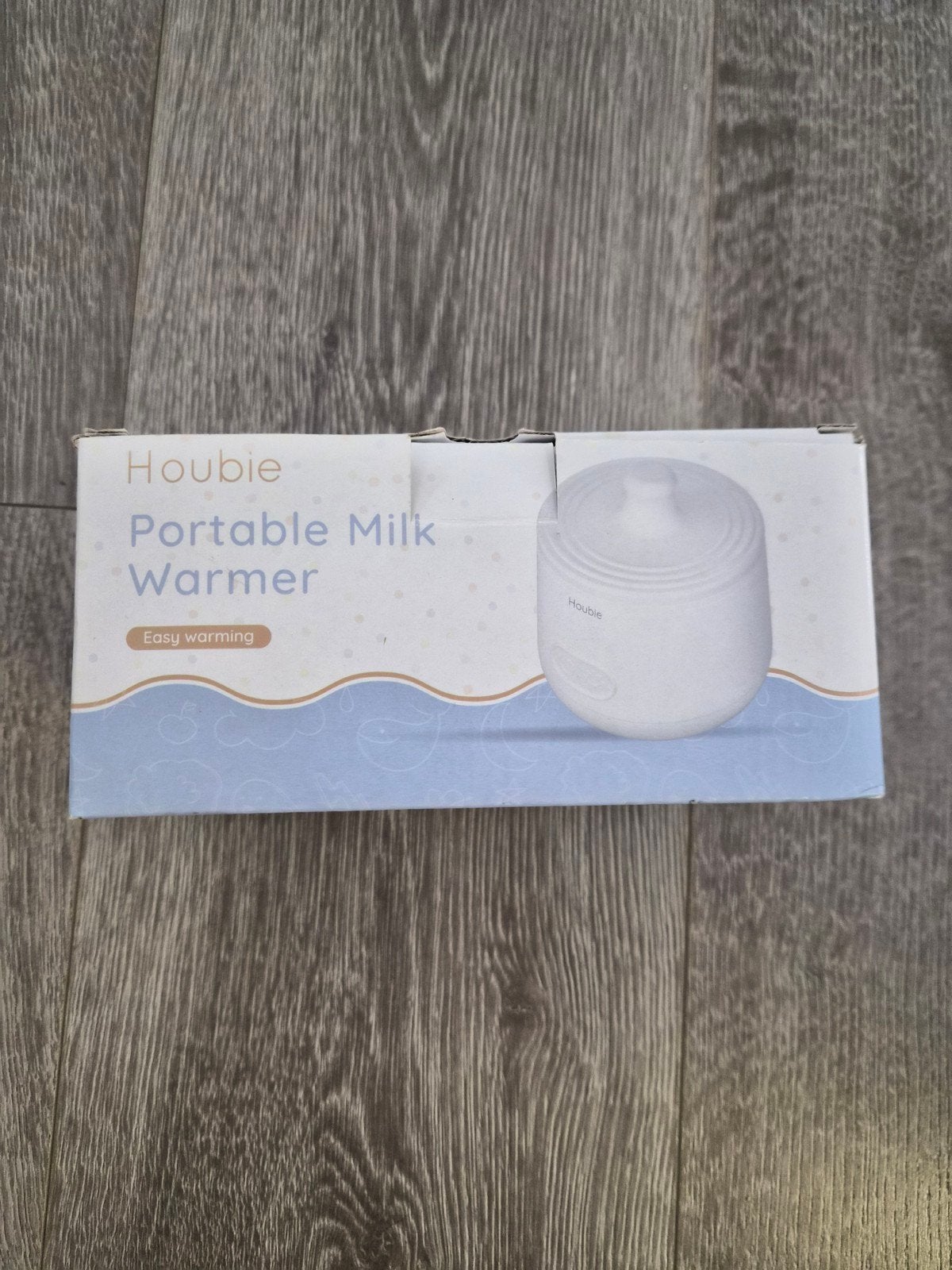 Houbie draagbare flessenwarmer, Ophalen