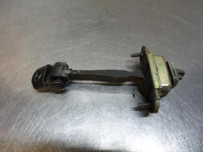 Butée 4portes arrière gauche d'un Ford Mondeo (Mondeo 00-), -, 3 mois de garantie, -, -