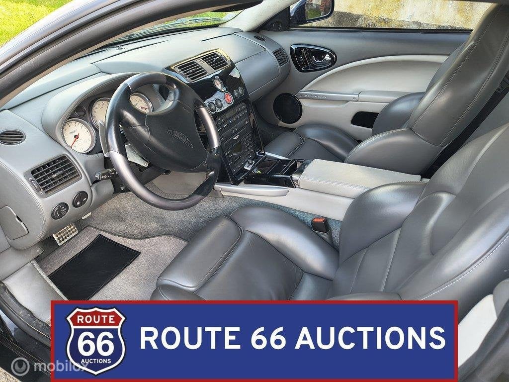 Aston Martin Vanquish | 2002 | Route 66 Auctions, Auto's, Aston Martin, Gebruikt, Zwart, Bedrijf, Handgeschakeld