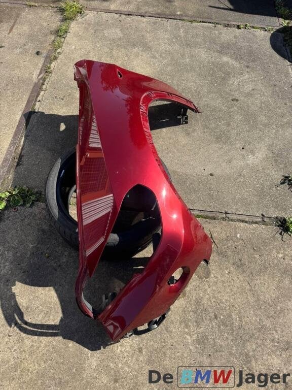 Linker spatbord vermilion rot A82 BMW X5 E70 51127157979, Gebruikt, Ophalen of Verzenden, BMW, BMW