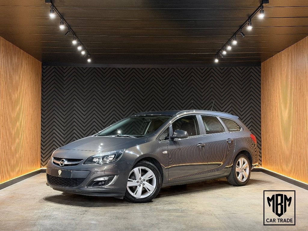 ✅ Opel Astra S.Tourer 1.4 Turbo GARANTIE Airco CruiseC 1.Eig, Auto's, Opel, Stof, 1503 kg, Zwart, 4 cilinders