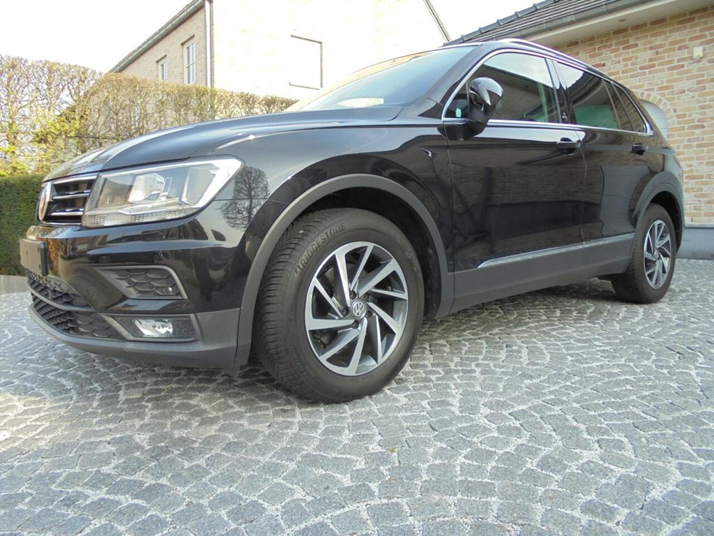 Volkswagen Tiguan 1.4 TSI 125pk SOUND / NAVI/ PDC/ CC/, Auto's, Volkswagen, 0 kg, 4 cilinders, https://public.car-pass.be/vhr/4fb53aa3-ffe2-4eb5-8519-a0baa4d288f3