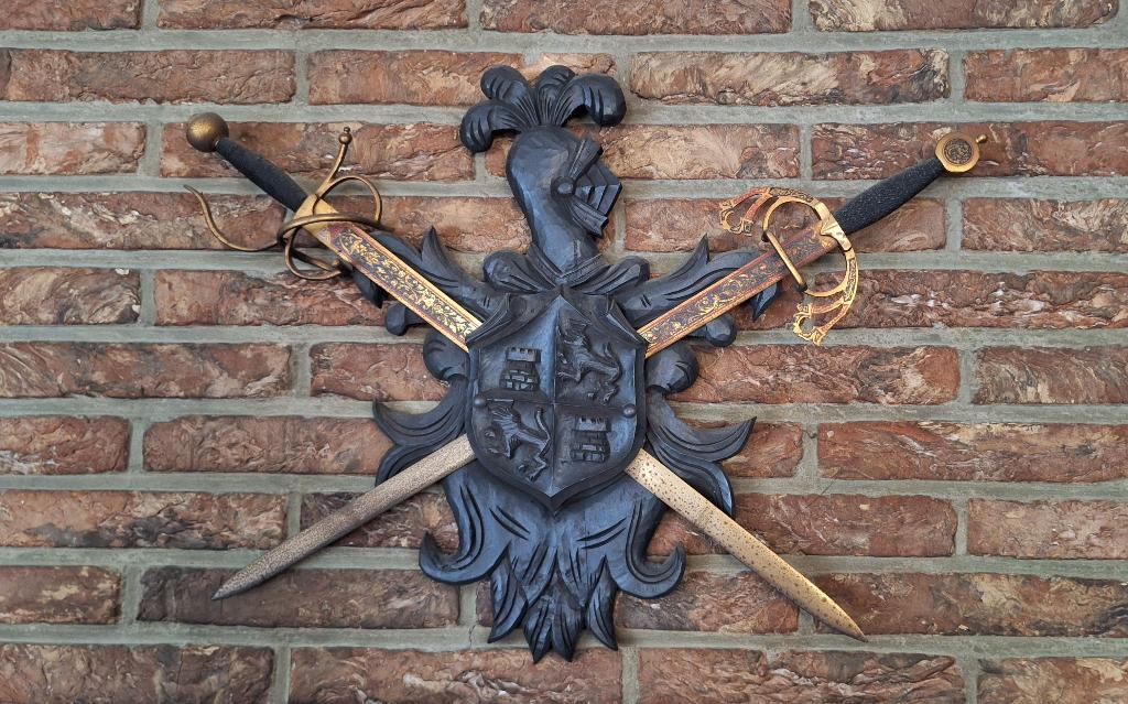 Wapenschild Zwaarden, Ophalen