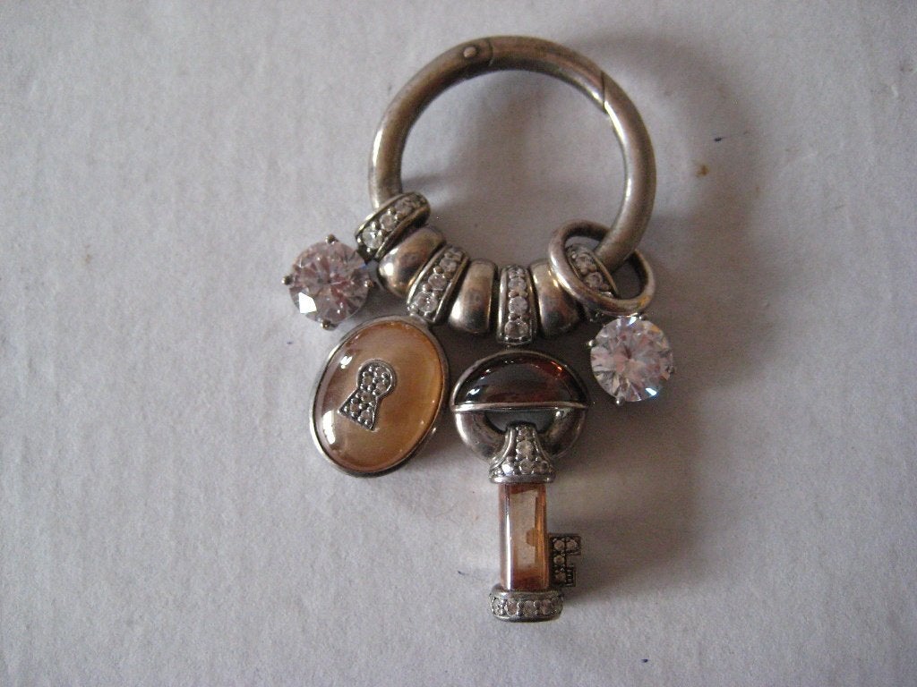 Hanger Tisento in zilver, Handtassen en Accessoires, Kettinghangers, Overige voorstellingen, Ophalen of Verzenden, Zo goed als nieuw