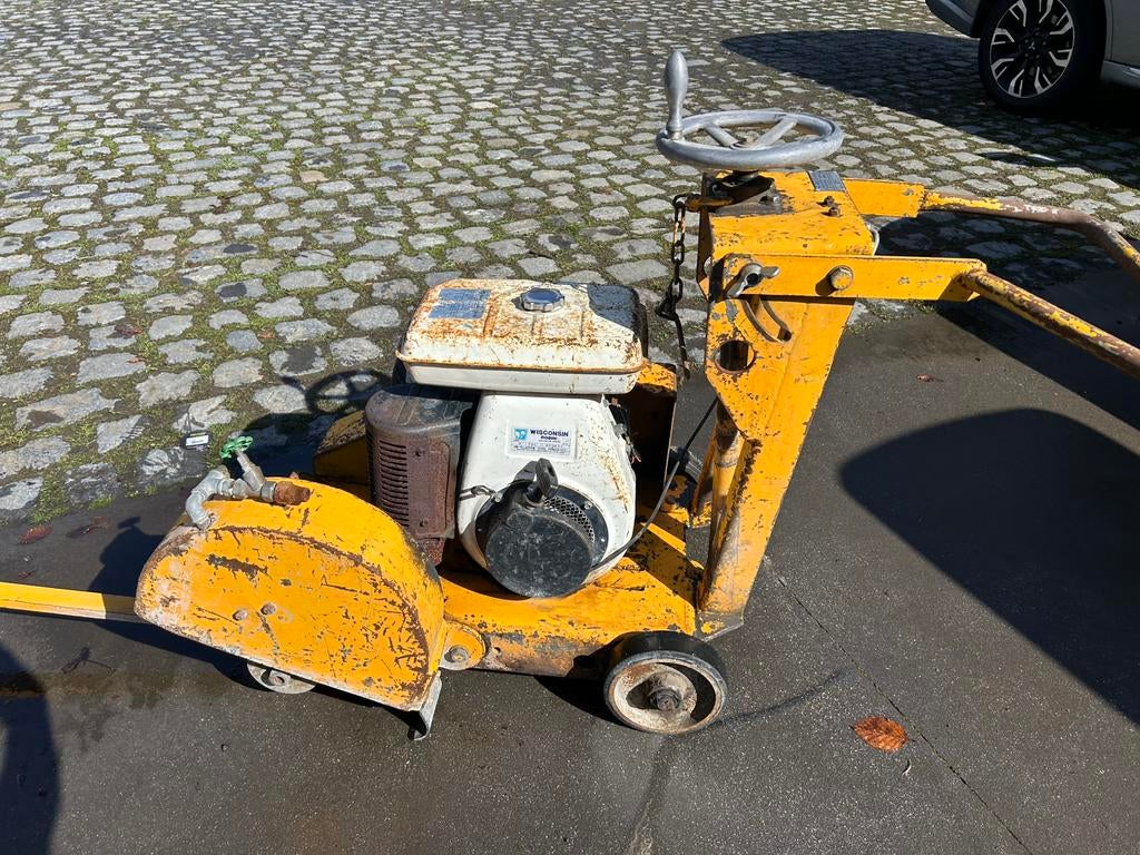 Professionele betonzaag met benzinemotor, Ophalen