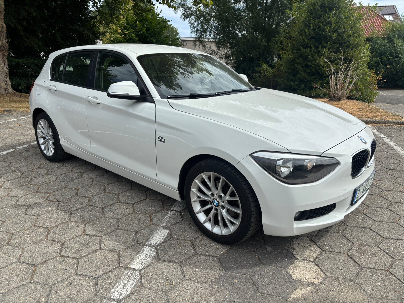 Prachtige BMW 114i benzine beperkte Editie met 74000 KM., Auto's, 4 cilinders, 1600 cc, Wit, Bedrijf
