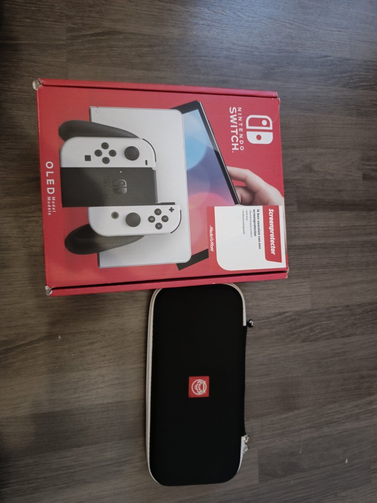 Niet gebruikt Nintendo swich oled met hoesje., Games en Spelcomputers, Ophalen of Verzenden