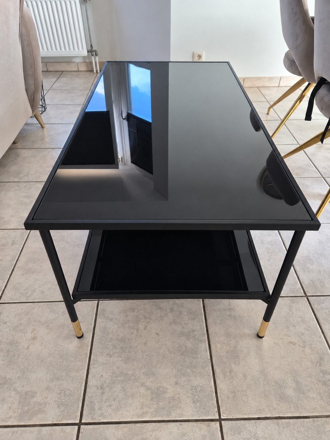 Table basse élégante en verre noir avec des accents dorés, 100 à 150 cm, Comme neuf, Verre, Enlèvement