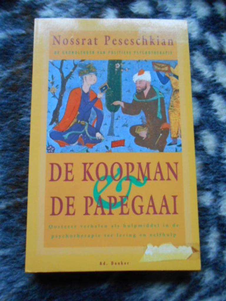 De Koopman en de papegaai - Nossrat Peseschkian, Ophalen of Verzenden