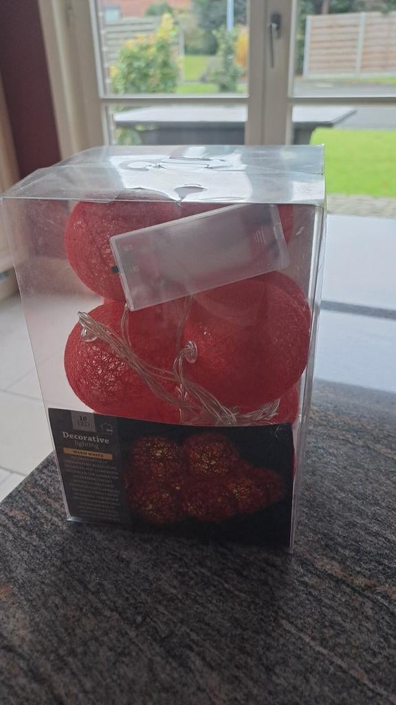 Kerstdecoratie met lichtsnoer, Ophalen