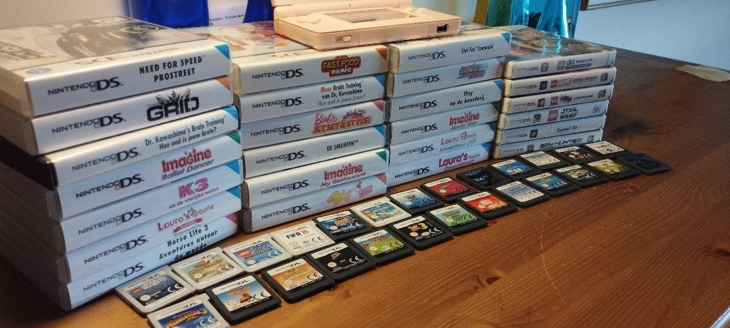 nintendo ds met ruim 50 spellen, Consoles de jeu & Jeux vidéo, Enlèvement ou Envoi, Rose, Comme neuf, Avec jeux