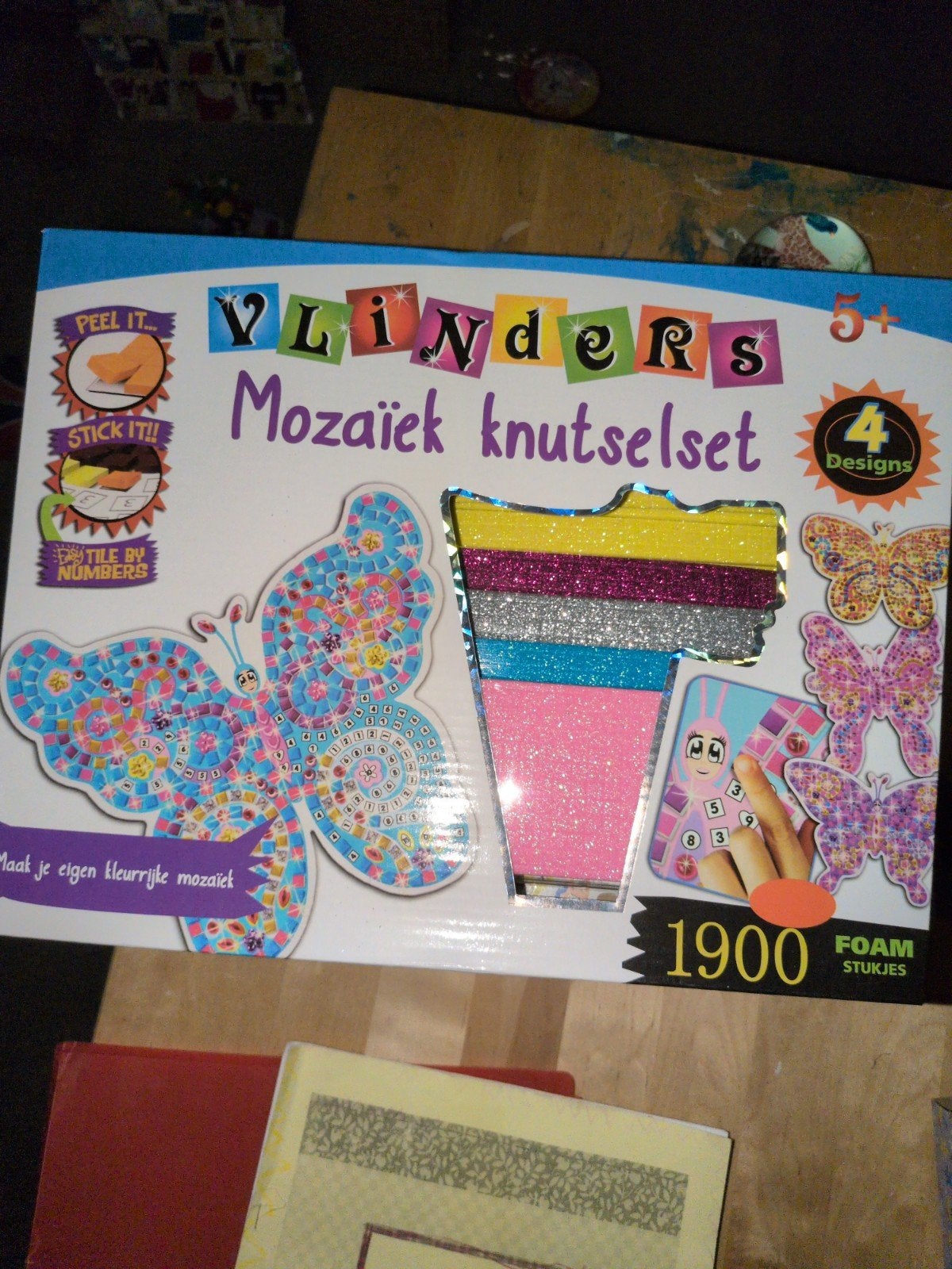 Mozaïek knutselset vlinders, Ophalen