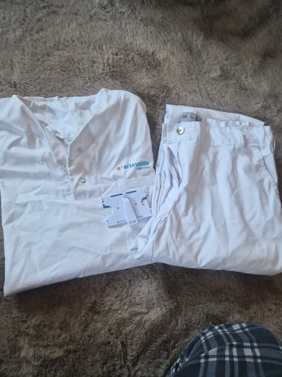 Praktijk kleding mondzorg pak, Ophalen