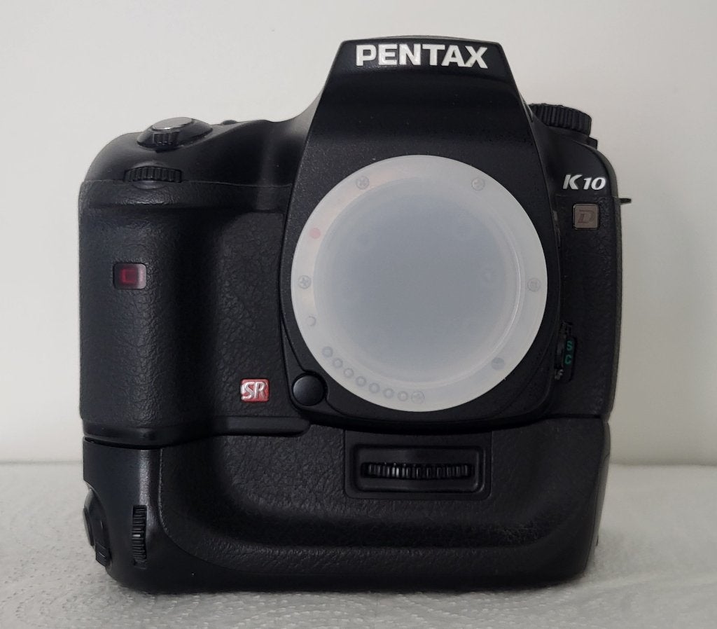 Pentax K10D DSLR Body + Originele D-BG2 Battery Grip, Enlèvement ou Envoi, Comme neuf, Autres marques