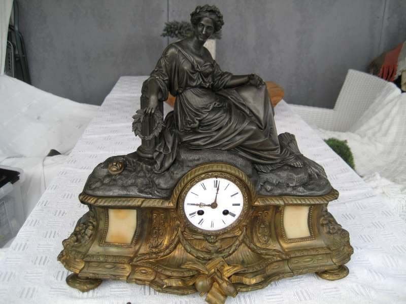 1 pendule en 2 hangklokken, Ophalen