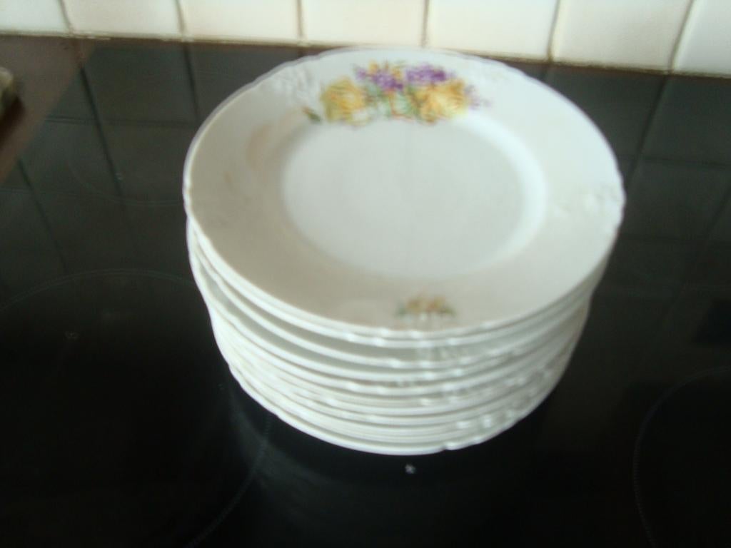 11 Porseleinen dessertborden., Ophalen