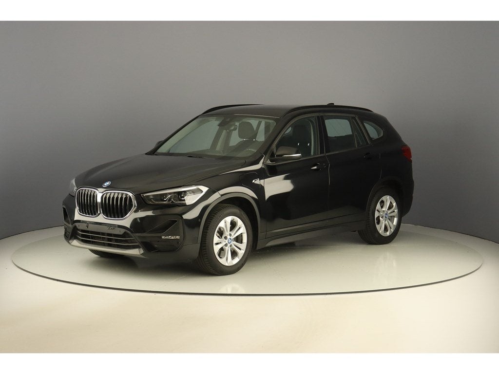 BMW X1 xDrive25e 220pk Pack Business, Auto's, Parkeersensor, Zwart, 5 zetels, 5 deurs