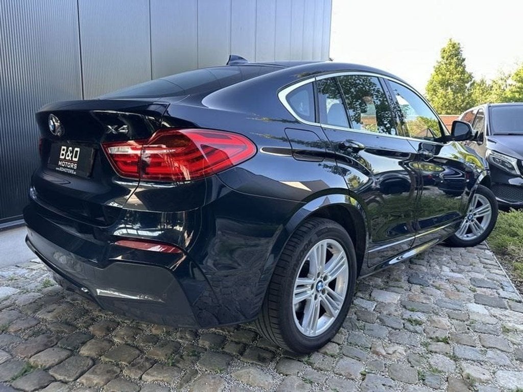 BMW X4 xDrive 20i AUT M Pack /Bruin Leder/Navi/67900 km Gar, Automaat, Euro 6, Zwart, 184 pk