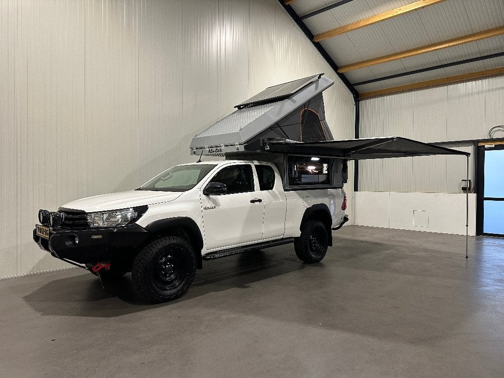 Toyota HiLux 2.4 D-4D-F XC Alucab Cannopy Camper, Auto's, 4 deurs, Wit, Leder, Vierwielaandrijving