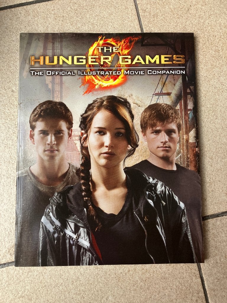 Boek The Hunger games ( filmboek ), Boeken, Film, Tv en Media, Ophalen of Verzenden
