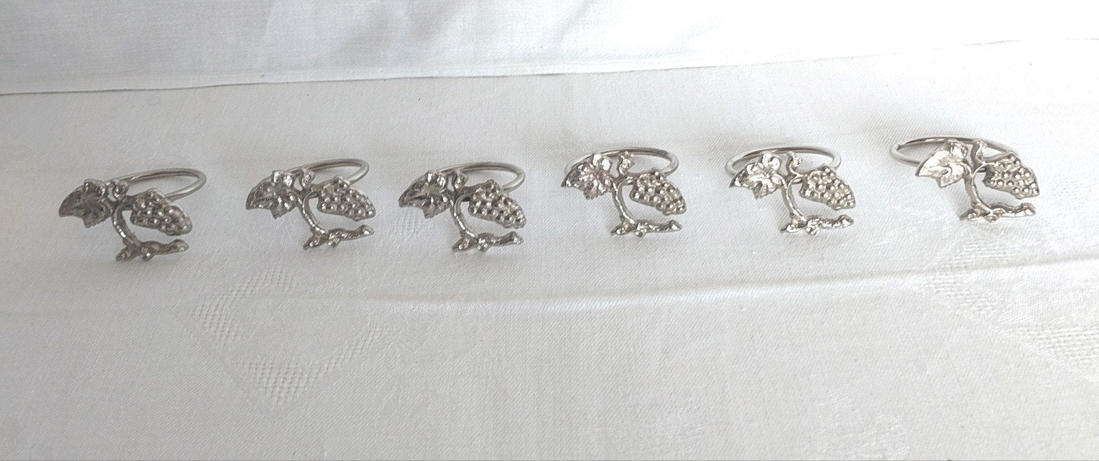 Set van 6 vintage tinnen servetringen met druivenrankpatro, Ophalen of Verzenden