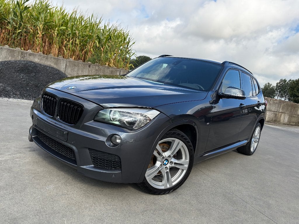 BMW X1 2.0 d sDrive16 Pack M ext/int - CarPlay - garantie, Auto's, BMW, 1995 cc, Zwart, 4 cilinders, Alcantara