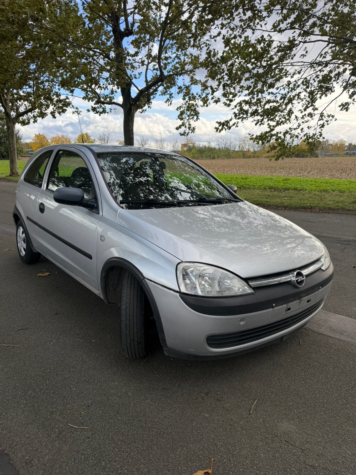 Opel Corsa C 1.2 Essence — 2003 — 127 000 km — avec contrôle, Autos, Argent ou Gris, 139 g/km, Entreprise, Noir