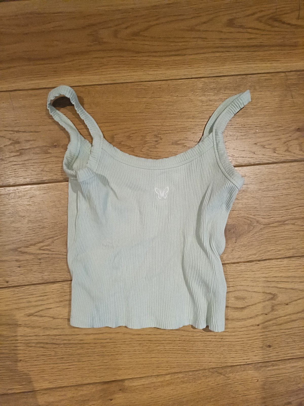 t-shirt bleue avec un petit papillon blanc, Manches courtes, Groggy, Comme neuf, Taille 34 (XS) ou plus petite