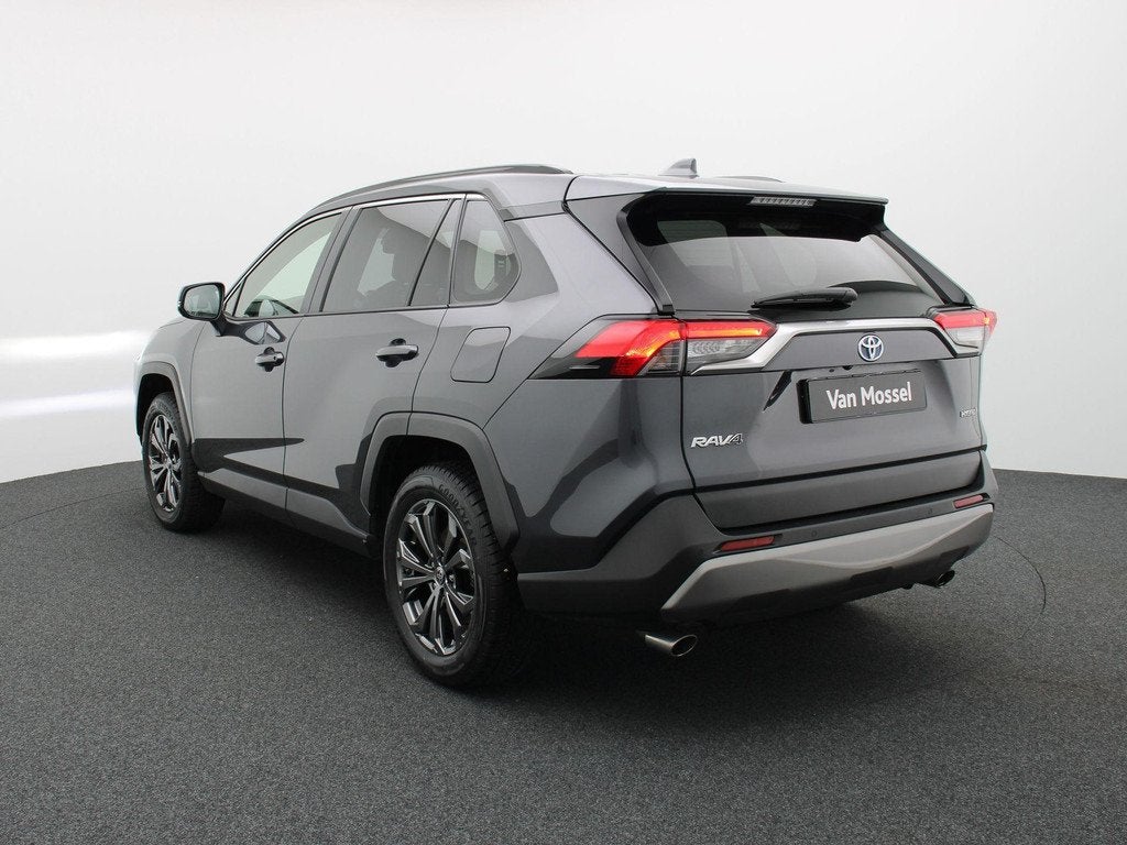 Toyota RAV4 2.5 Hybrid Dynamic Plus e-CVT HEV, Auto's, Stof, Gebruikt, Plug-in hybride, Bedrijf