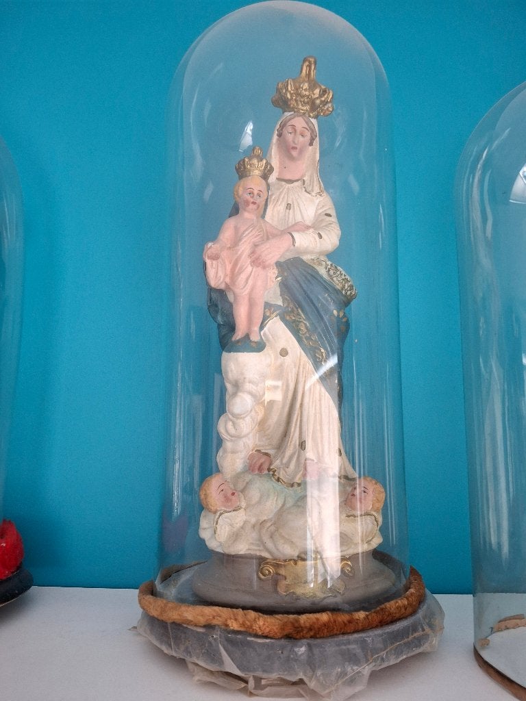 Mariabeeld onder stolp, Ophalen