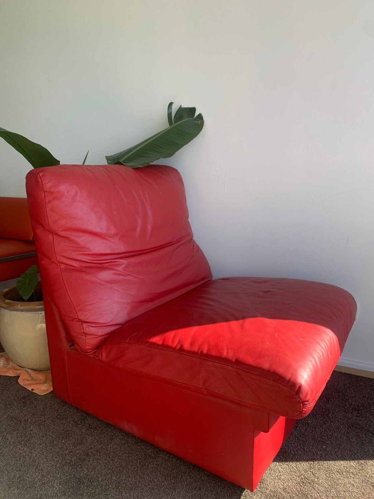 fauteuil en cuir rouge, Enlèvement, Cuir