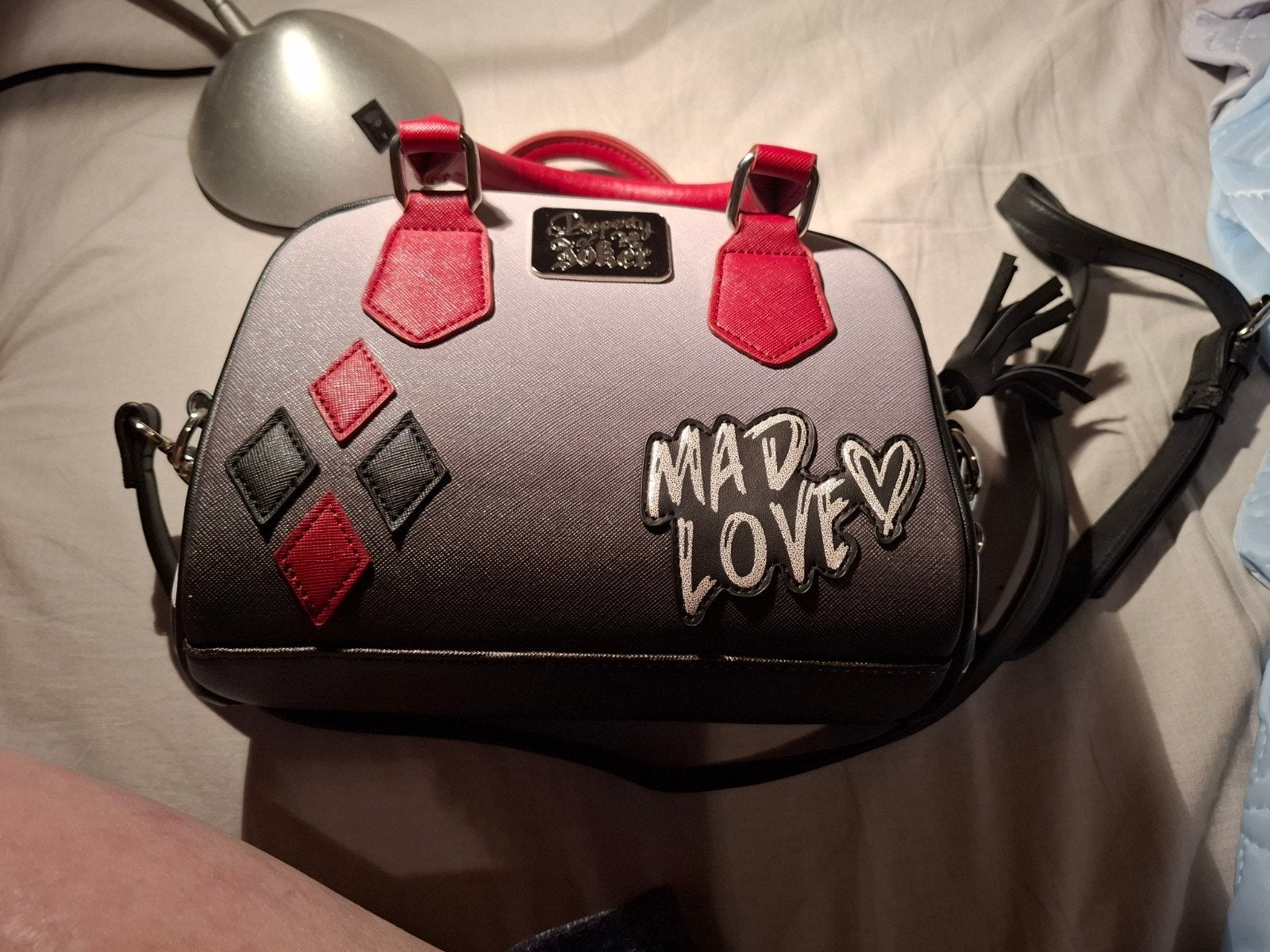 harley quinn handtas, Enlèvement