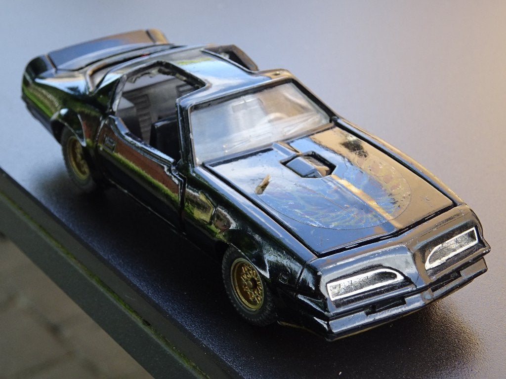 Pontiac Firebird Trans Am 1979 - K. K. Sakura - 1/43, Hobby & Loisirs créatifs, Voitures miniatures | 1:43, Utilisé, Voiture, Autres marques