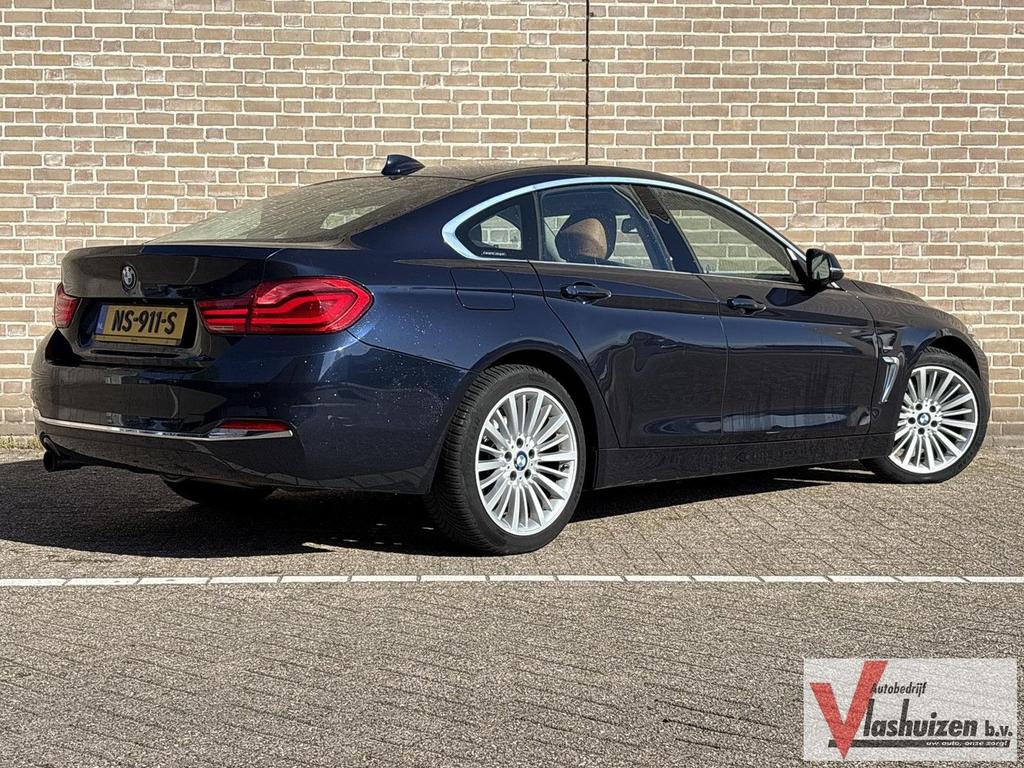 BMW 418 Gran Coupé 4-serie 418i High Executive Automaat | Le, Auto's, BMW, Automaat, 4 Reeks Gran Coupé, Blauw, 130 g/km