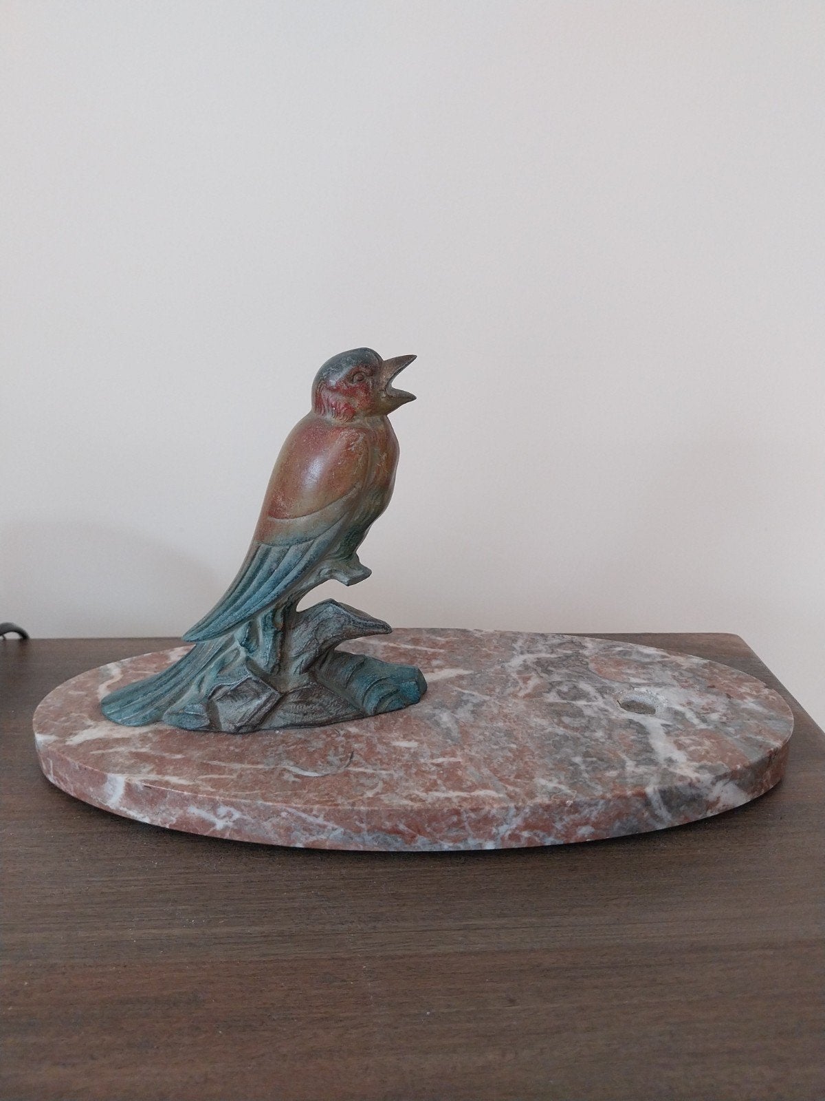 Art deco vogel beeldje, Ophalen