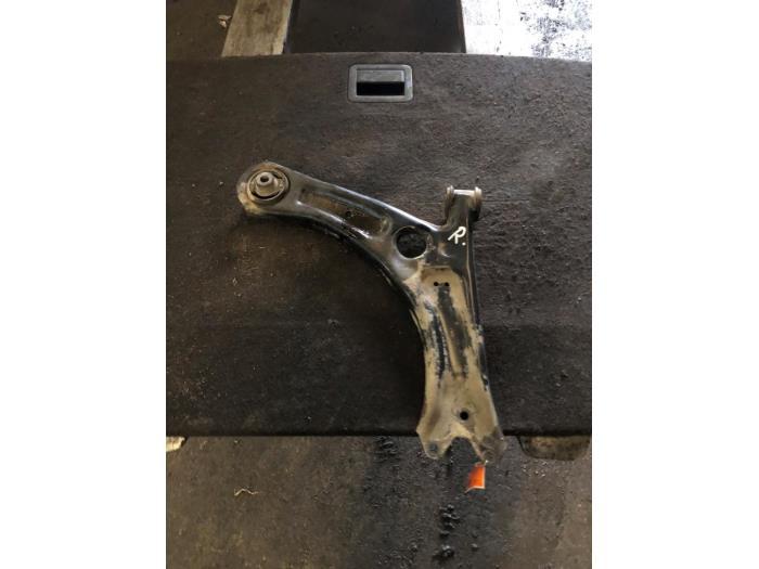 Draagarm rechts-voor van een Volkswagen Caddy, Ophalen of Verzenden, 3 maanden garantie, Gebruikt, Volkswagen