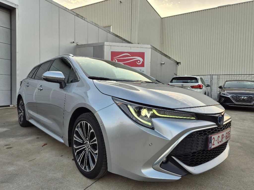 Toyota Corolla SW 1.8i AUTO. HYBRID 81.196 KM ! PACK SPORT !, Auto's, Automaat, 4 cilinders, https://public.car-pass.be/vhr/e0a665b7-c2e9-471e-9632-685d0eedc5bb