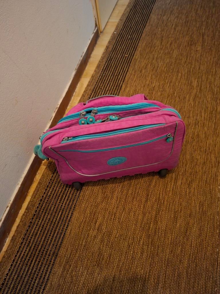 boekentas kipling, Ophalen