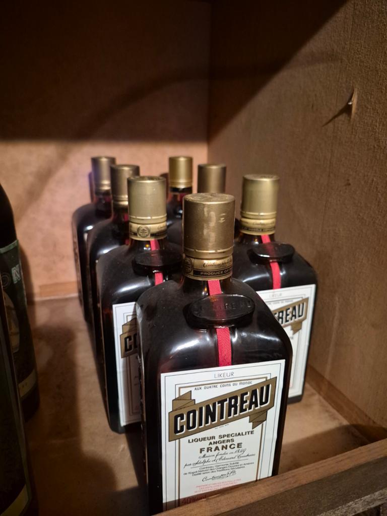 Cointreau,pisang,Amaretto en rhum, Ophalen
