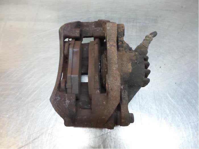 Etrier de frein (pince) avant gauche d'un Peugeot 206, -, 3 mois de garantie, Utilisé, -
