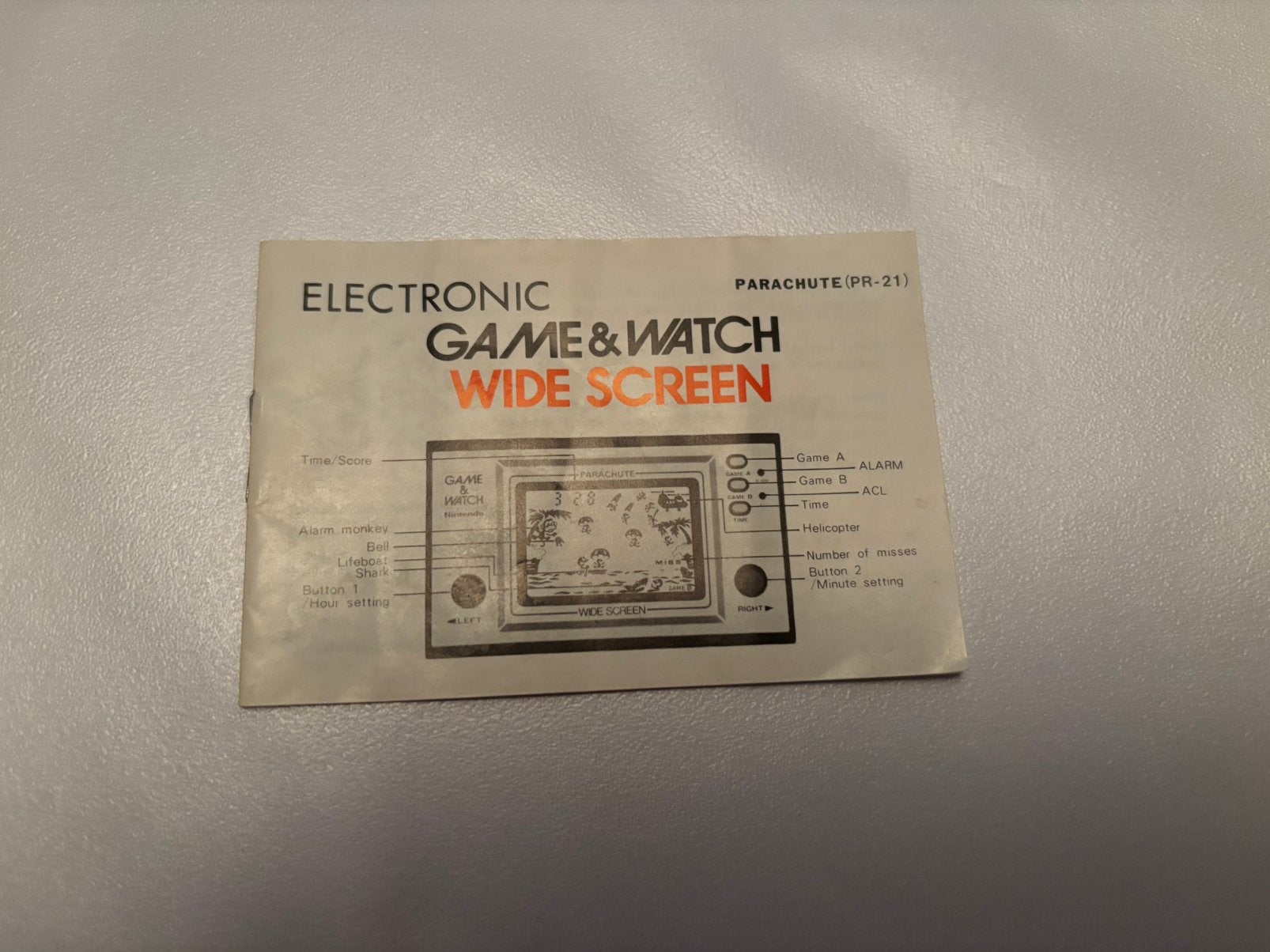 Game&Watch origineel instructie boekje Parachute, Nintendo, Ophalen of Verzenden, Zo goed als nieuw, Nintendo