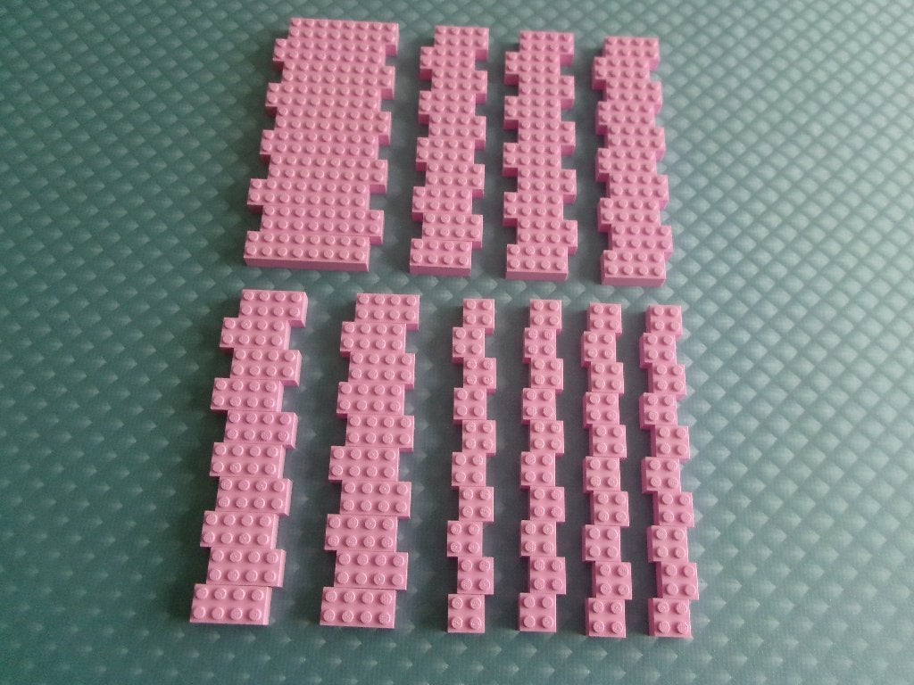 100 helder roze Lego 2x.. stenen, Gebruikt, Lego, Ophalen of Verzenden, Losse stenen