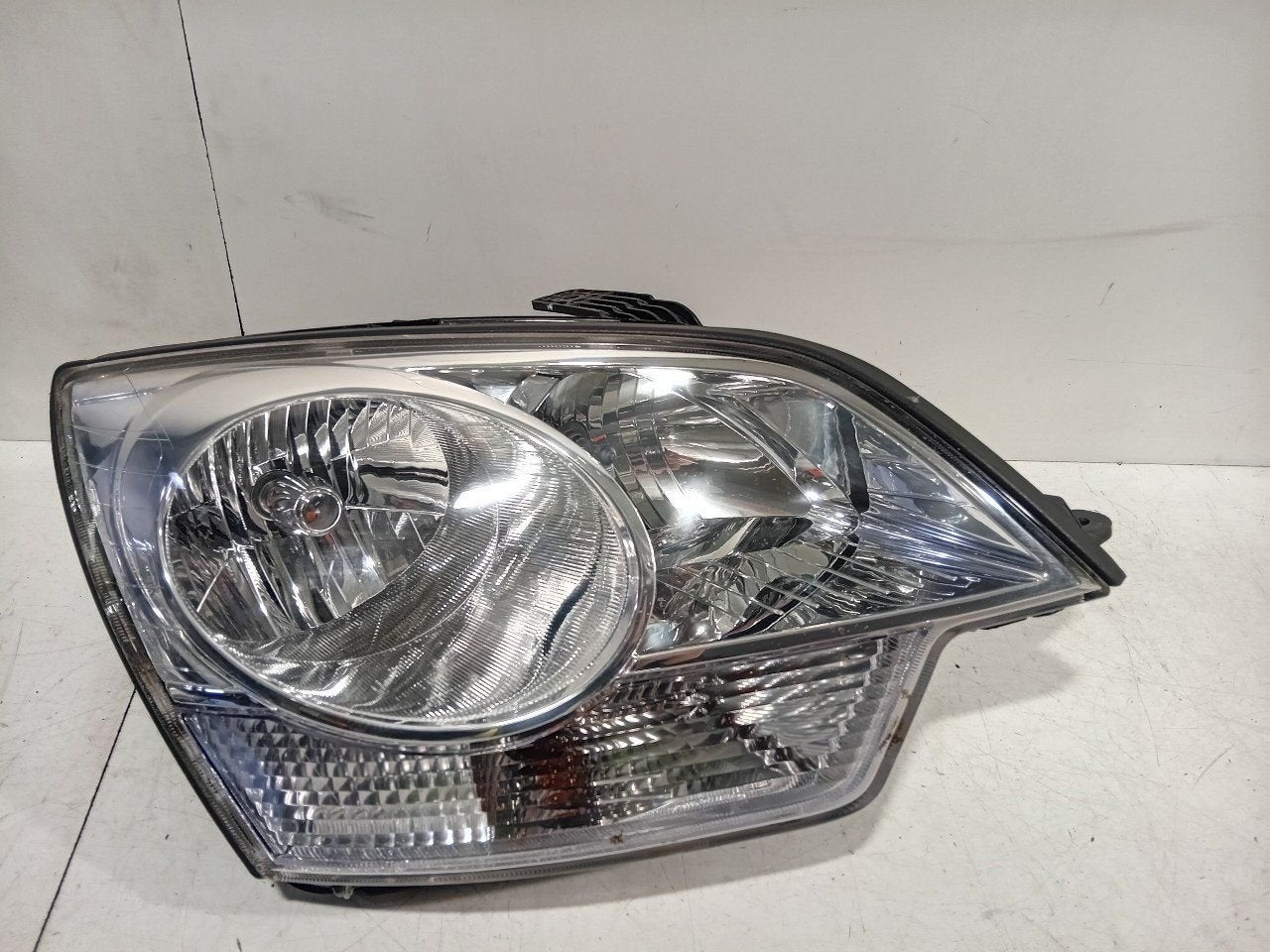 Koplamp rechts Opel Antara, Auto-onderdelen, Verlichting, Onderdelen@venauto.nl, Van der Ven Autorecycling B.V., Gebruikt, Ettenseweg 76, 4706 PB Roosendaal, The Netherlands