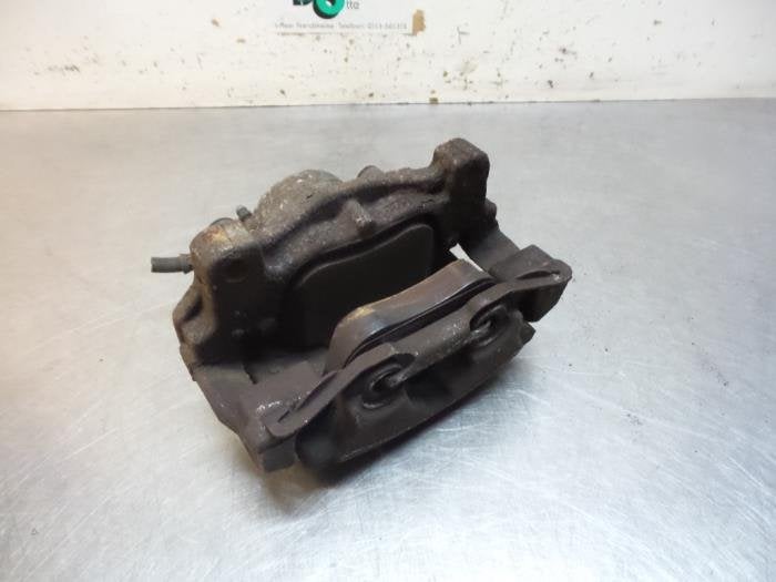 Etrier de frein (pince) avant gauche d'un Ford Mondeo (Monde, -, 3 mois de garantie, -, -