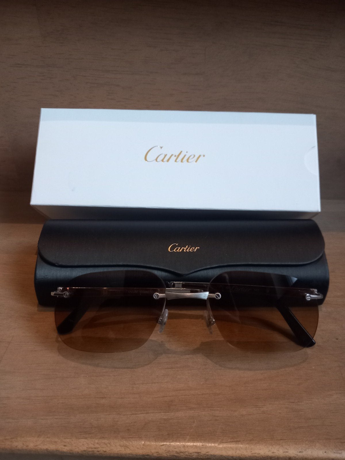 Cartier CT0407O Titanium Transparent, Overige merken, Gebruikt, Zonnebril, Ophalen of Verzenden