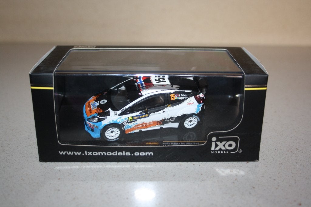 1:43 IXO Ford Fiesta RS WRC M.Ostberg/J.Andersson rally., Enlèvement ou Envoi, Comme neuf, Voiture