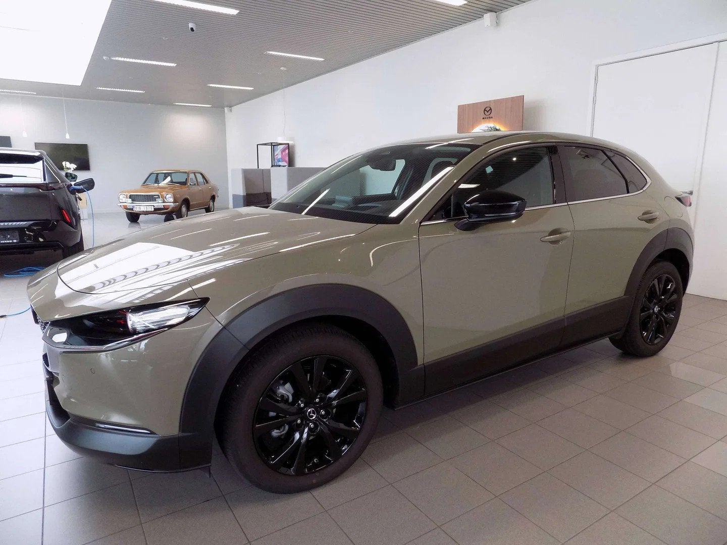 Mazda CX-30 2.0i SKYACTIV-X MHE Homura Automaat! (bj 2025), Auto's, Automaat, 1998 cc, Stof, Gebruikt