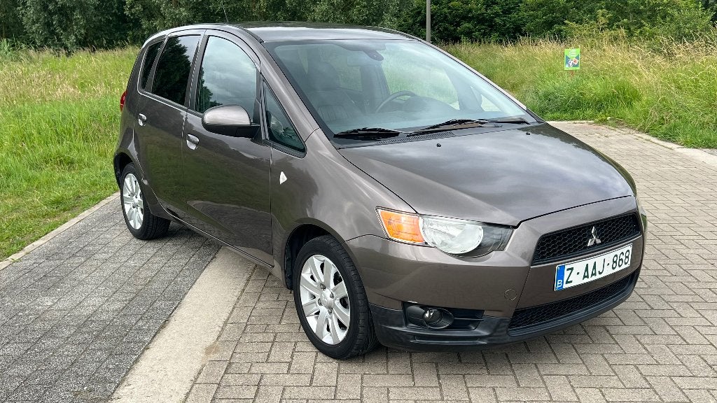 Mitsubishi Colt 1.3i Automaat Airco Euro 5 Gekeurd VVK, Auto's, Automaat, Euro 5, https://public.car-pass.be/vhr/af93c6db-3e18-4354-a378-18cfe2455c91